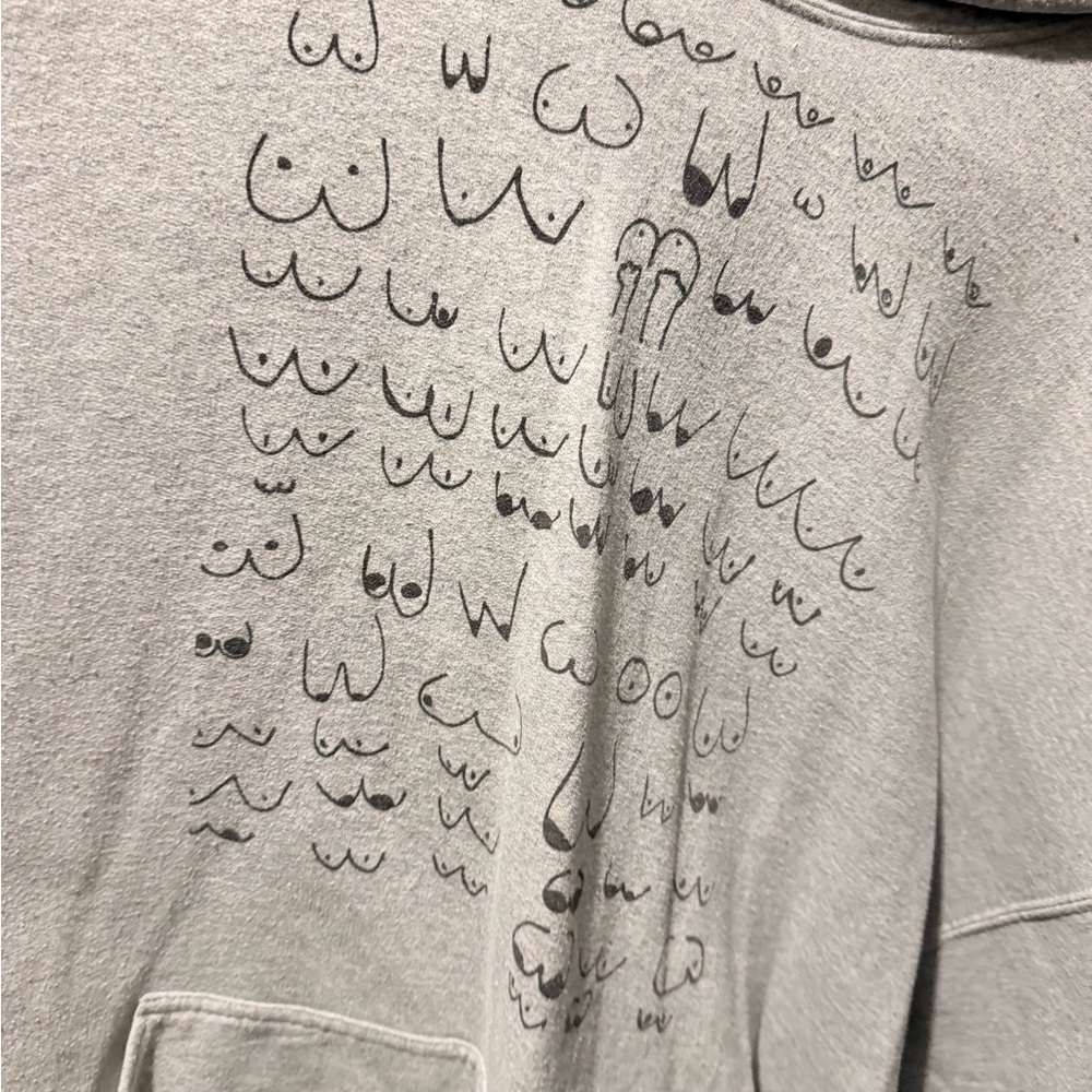 Gray Hoodie with Unique Graphic Design